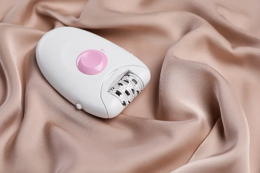 Epilator removing leg hair — automated plucking device for hair removal