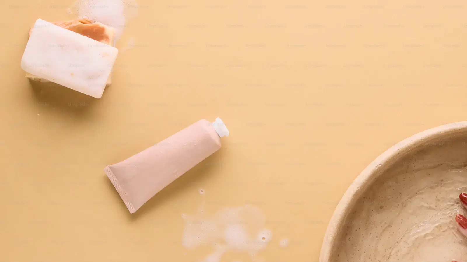 The complete femboy skincare routine — AM and PM products arranged for smoother, more feminine-looking skin on AMAB faces