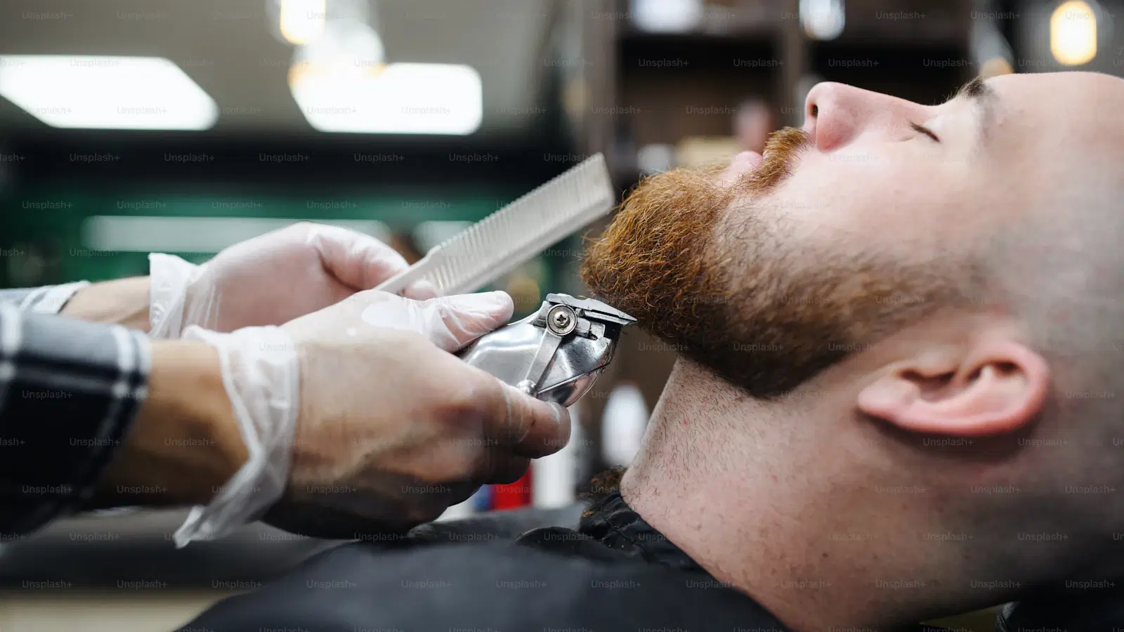 Esthetician using cotton thread to remove facial hair on a man's upper lip — the basic hair threading technique explained