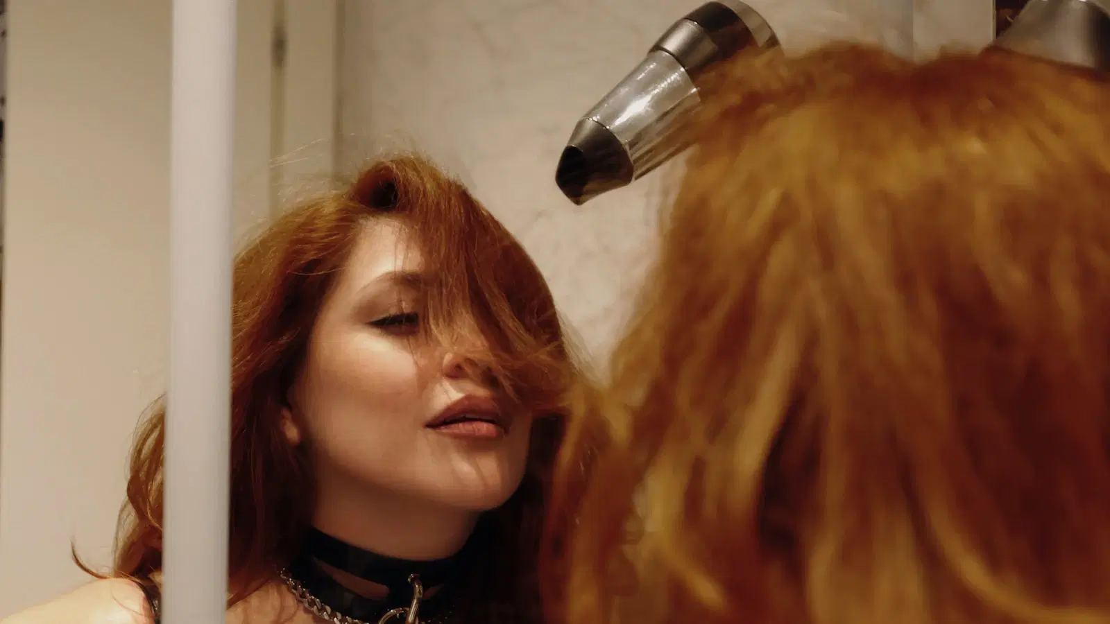 Femboy starter wardrobe flatlay — pleated mini skirt, striped thigh-high socks, oversized crop tee, and choker