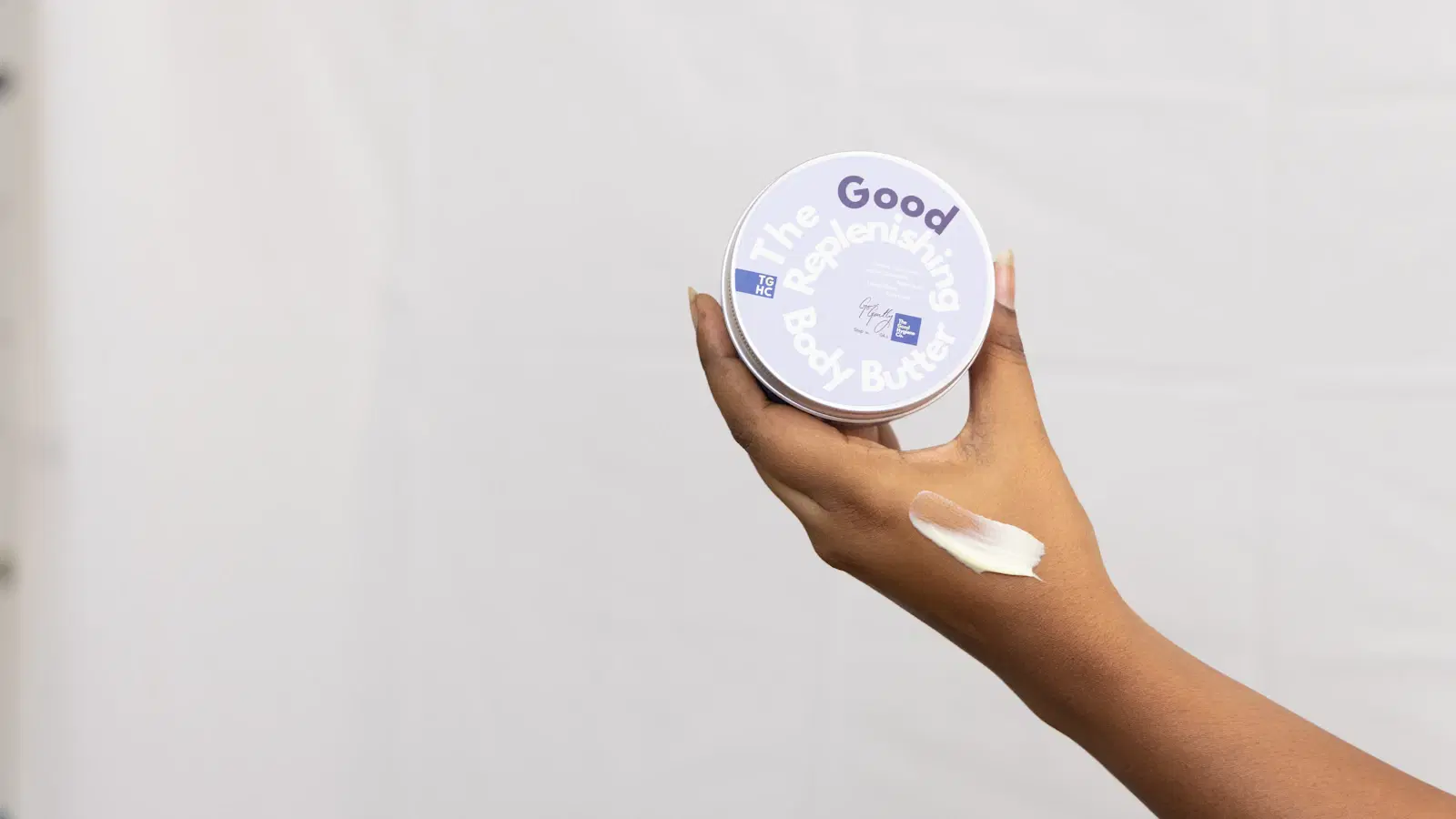 Applying a lightweight gel moisturizer to a man's cheek and jaw — absorbs with no shine and keeps oily skin smooth