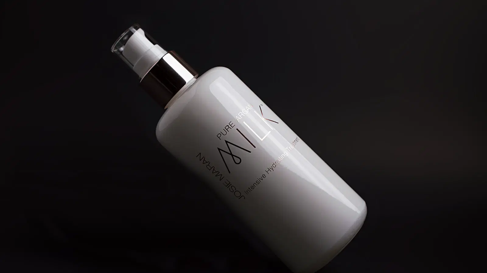 Fragrance-free body lotion being applied to post-shave skin — the final step in preventing razor bumps and irritation