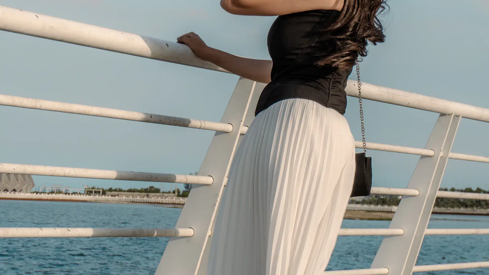 Laser hair removal for men — handheld diode laser treating the chest during a clinic session with cooling tip and protective goggles