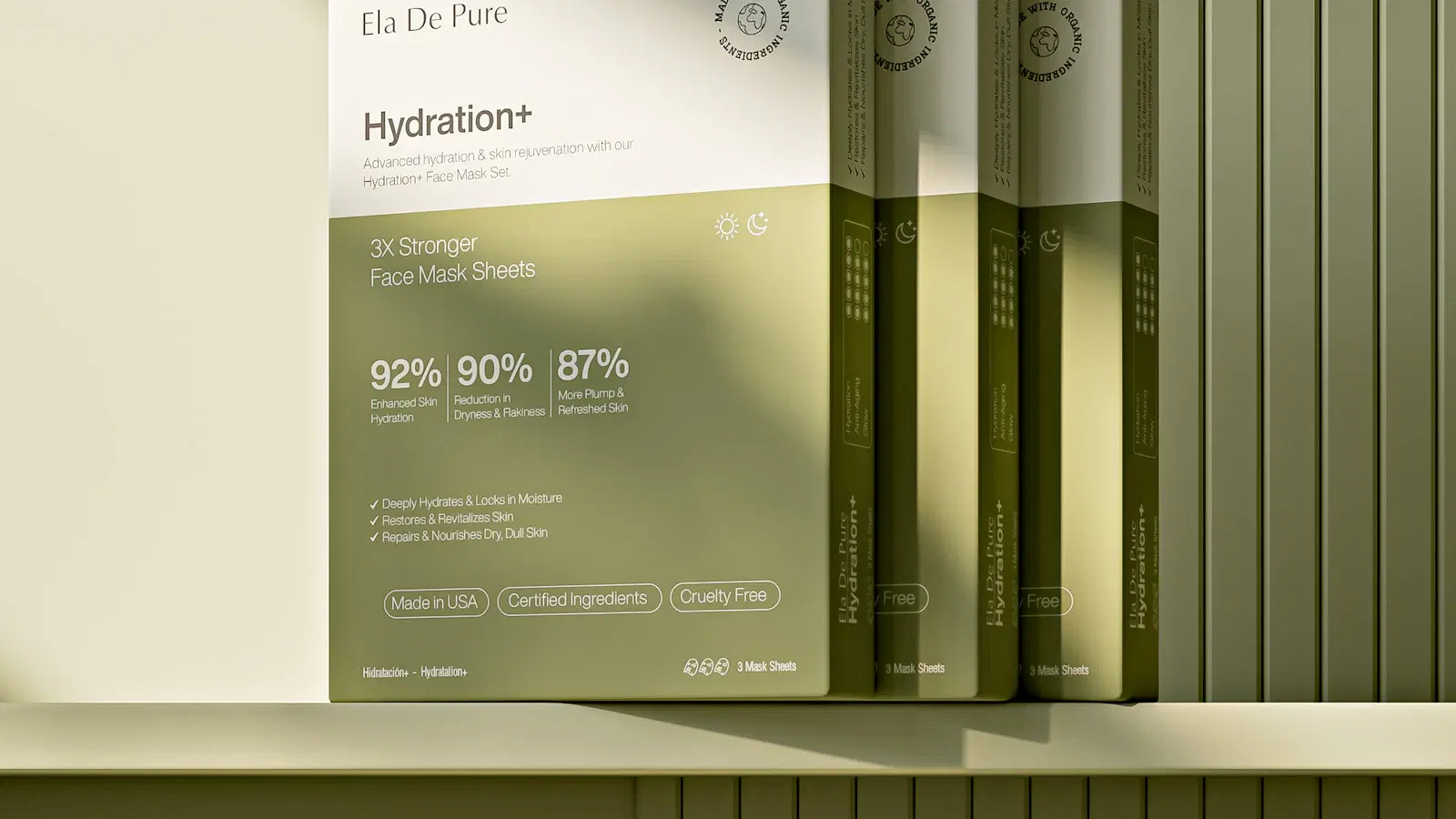 Waxing room setup for a manzilian — padded table with disposable sheet, hard-wax warmer on a rolling cart, soothing azulene oil, and post-wax aloe