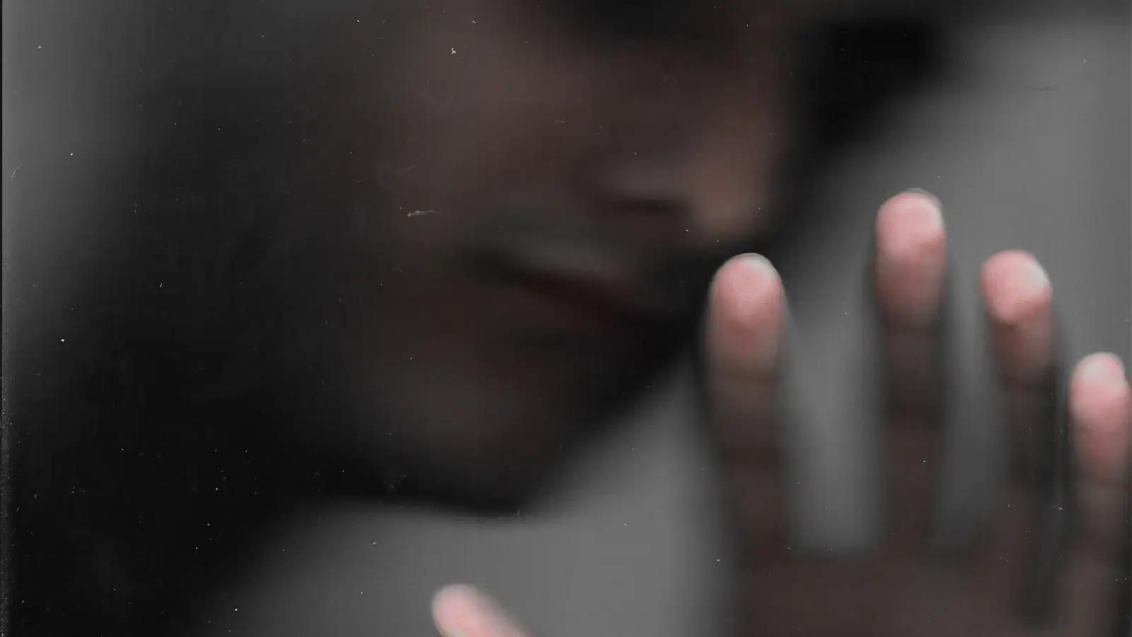 Nair For Men being applied to a male calf with an even thick layer — correct application technique for legs takes 6 to 8 minutes