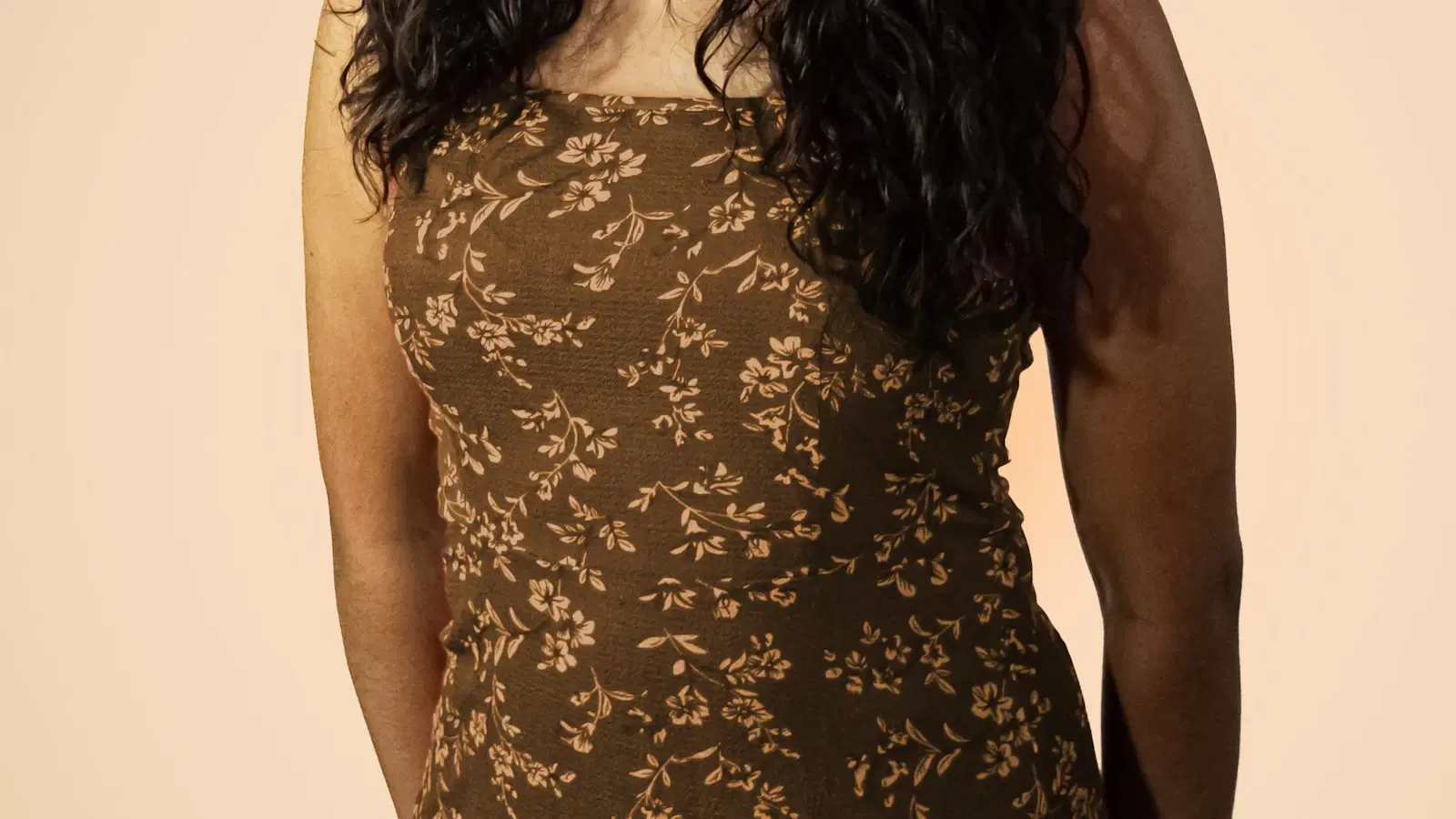Threading a moustache — technician holds the twisted cotton thread against the upper lip to lift fine hair from the follicle