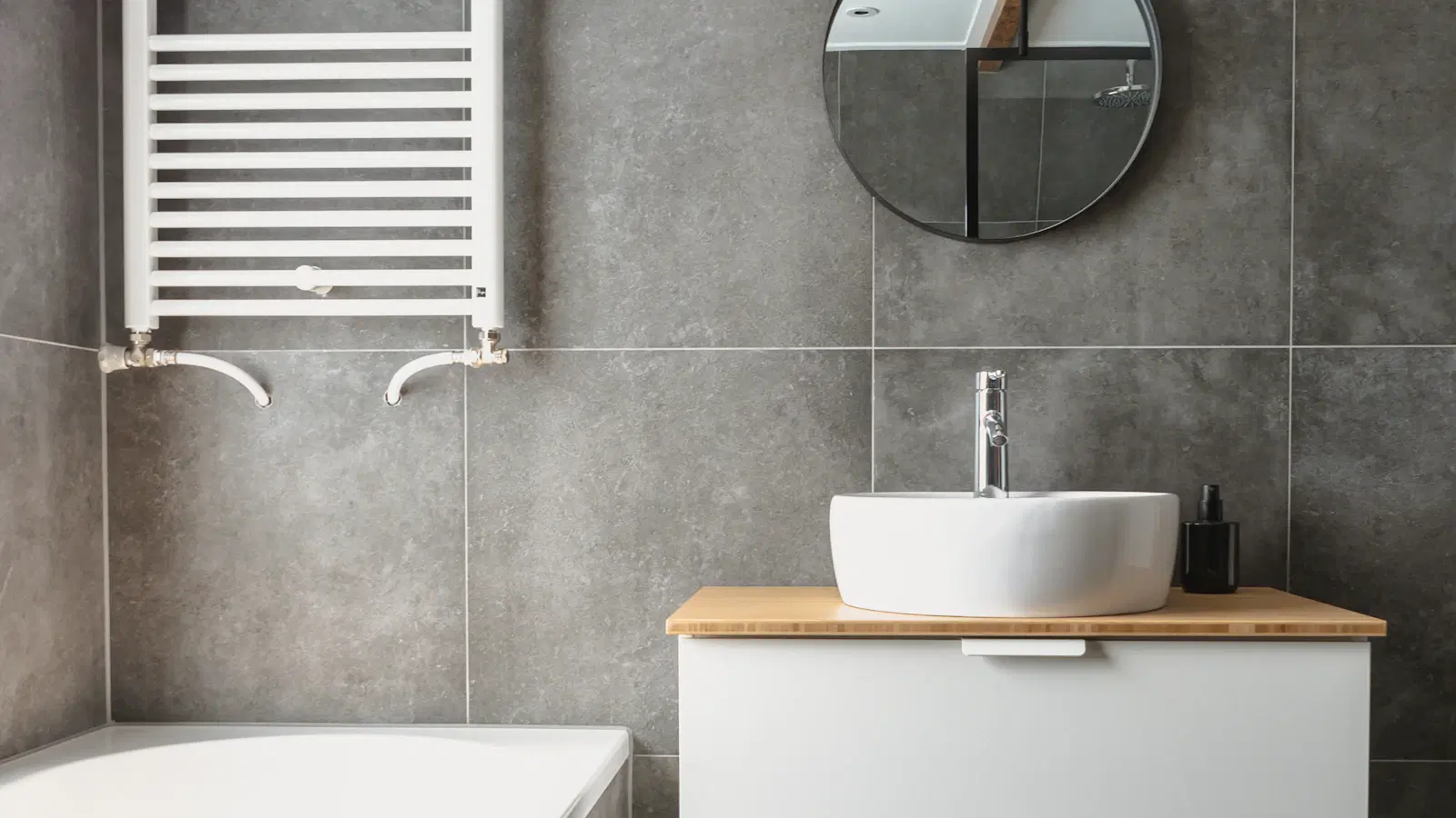 Clean salon treatment room with sugar paste jar, cotton powder, and aftercare products laid out — the sugar manzilian setup