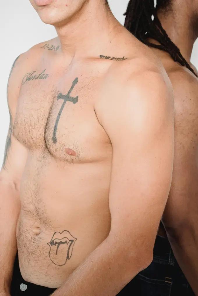 Two tattooed people with natural body hair, demonstrating conditioner and oil softening routines